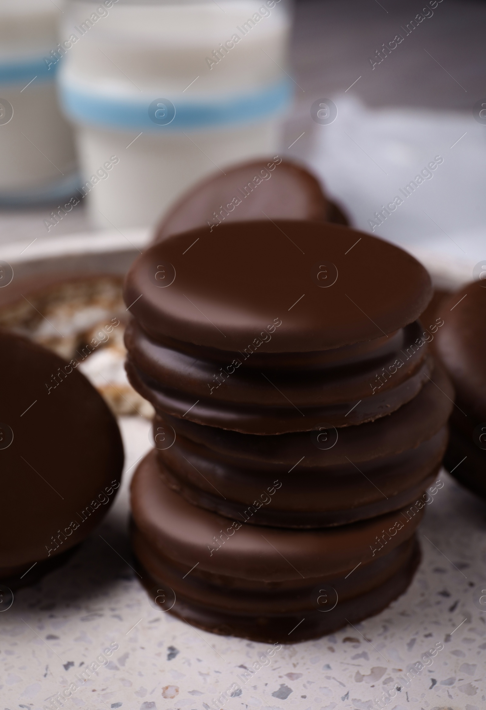 Photo of Tasty choco pies in plate, closeup view