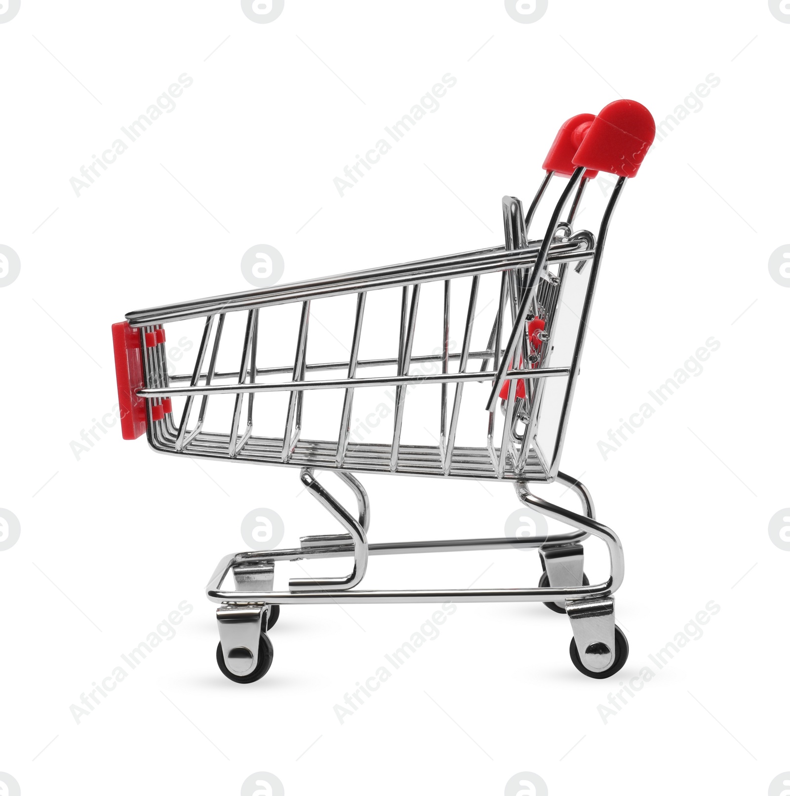 Photo of Empty mini metal shopping cart isolated on white