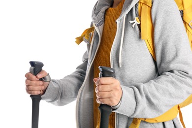 Photo of Female hiker with backpack and trekking poles on white background, closeup