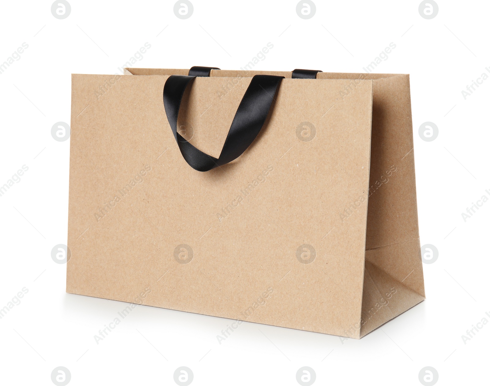 Photo of Paper shopping bag isolated on white. Mock up for design