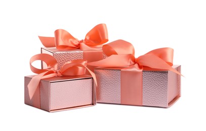 Photo of Three beautiful pink gift boxes on white background