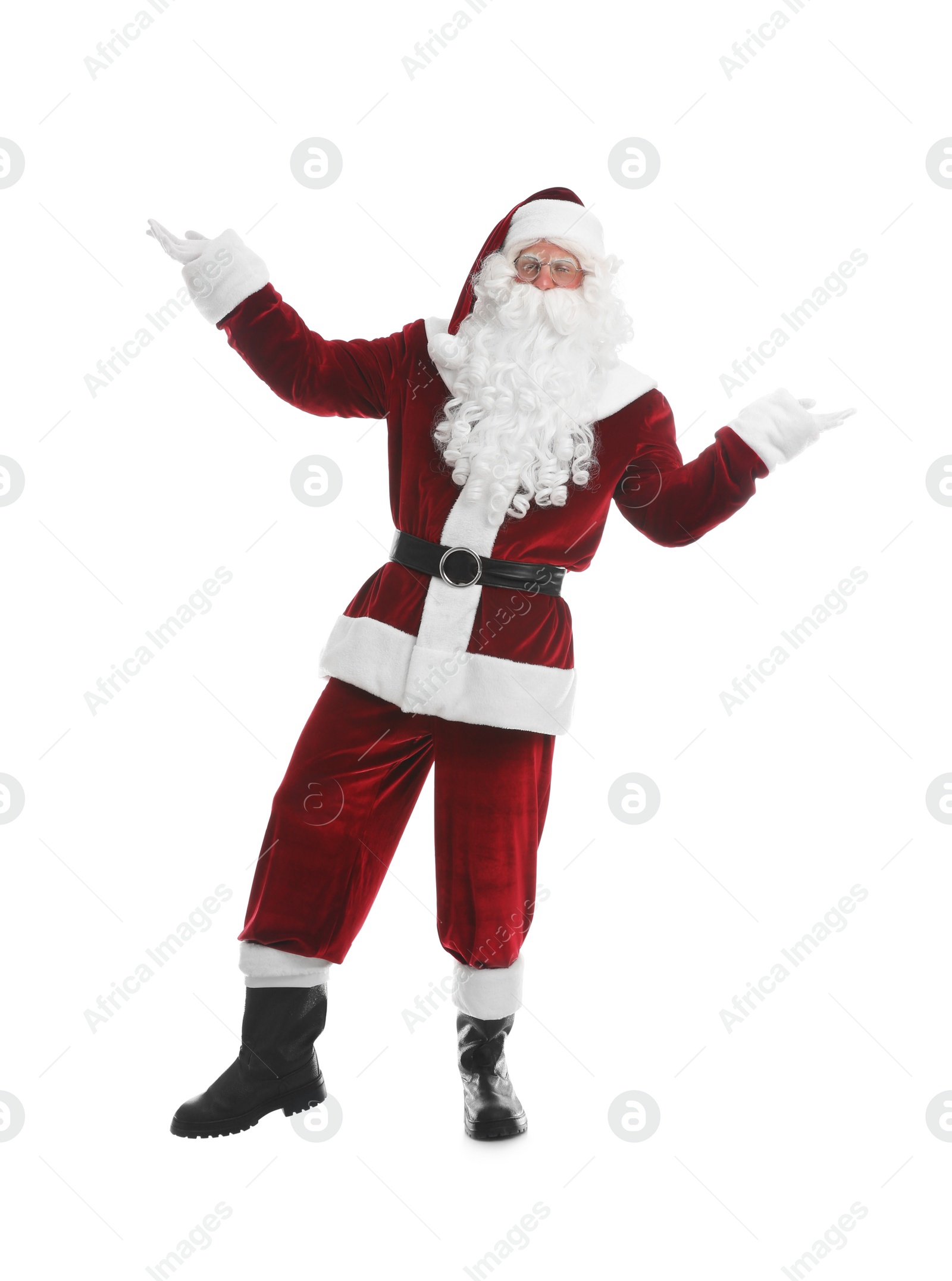 Photo of Full length portrait of Santa Claus on white background