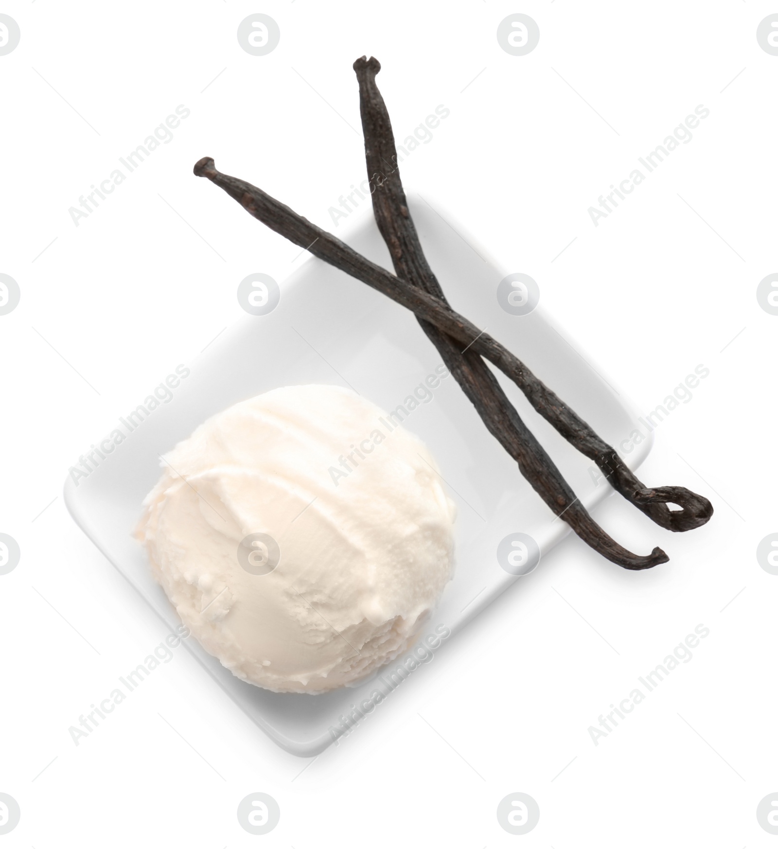 Photo of Bowl with delicious vanilla ice cream and pods on white background