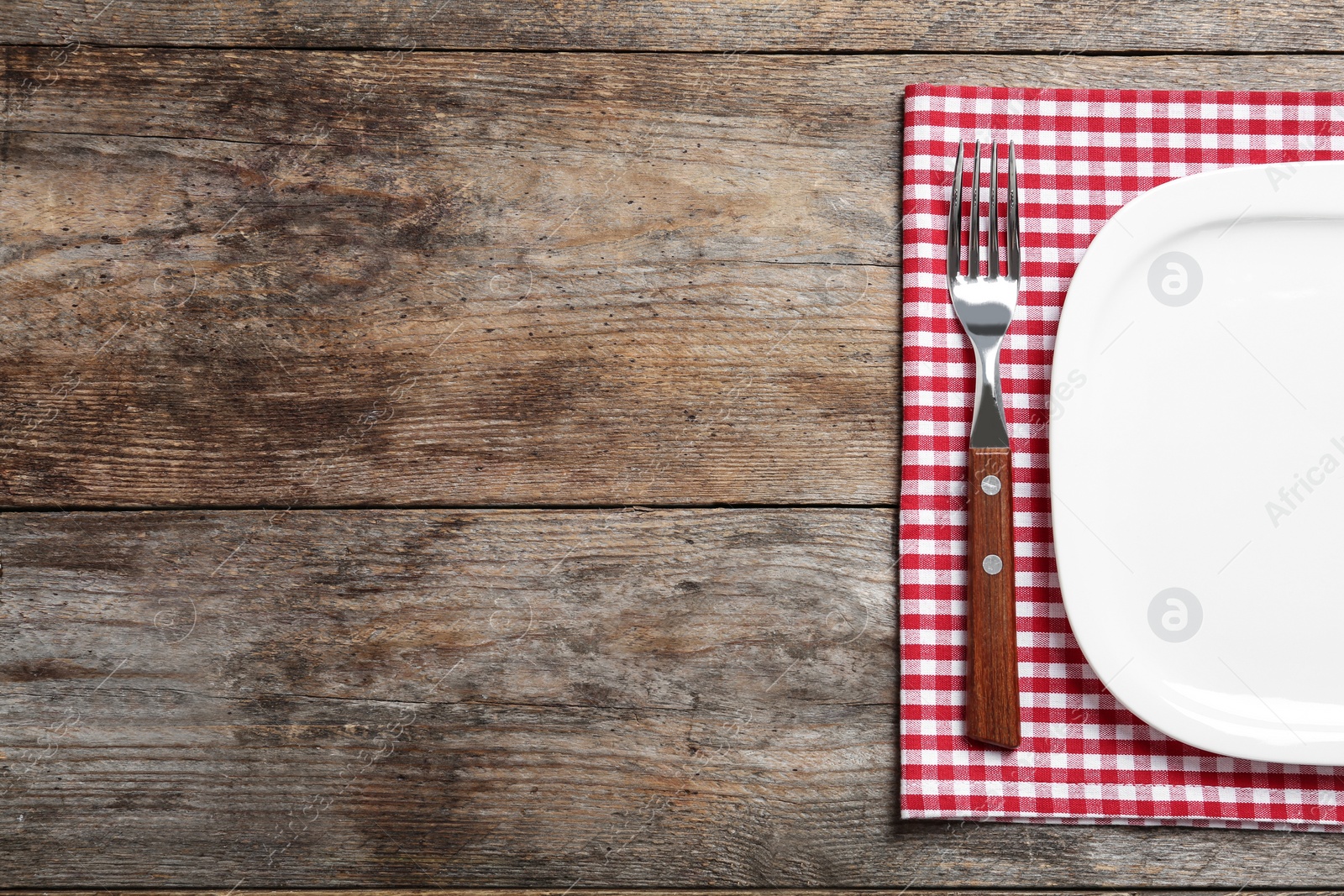 Photo of Stylish elegant table setting on wooden background, top view. Space for text