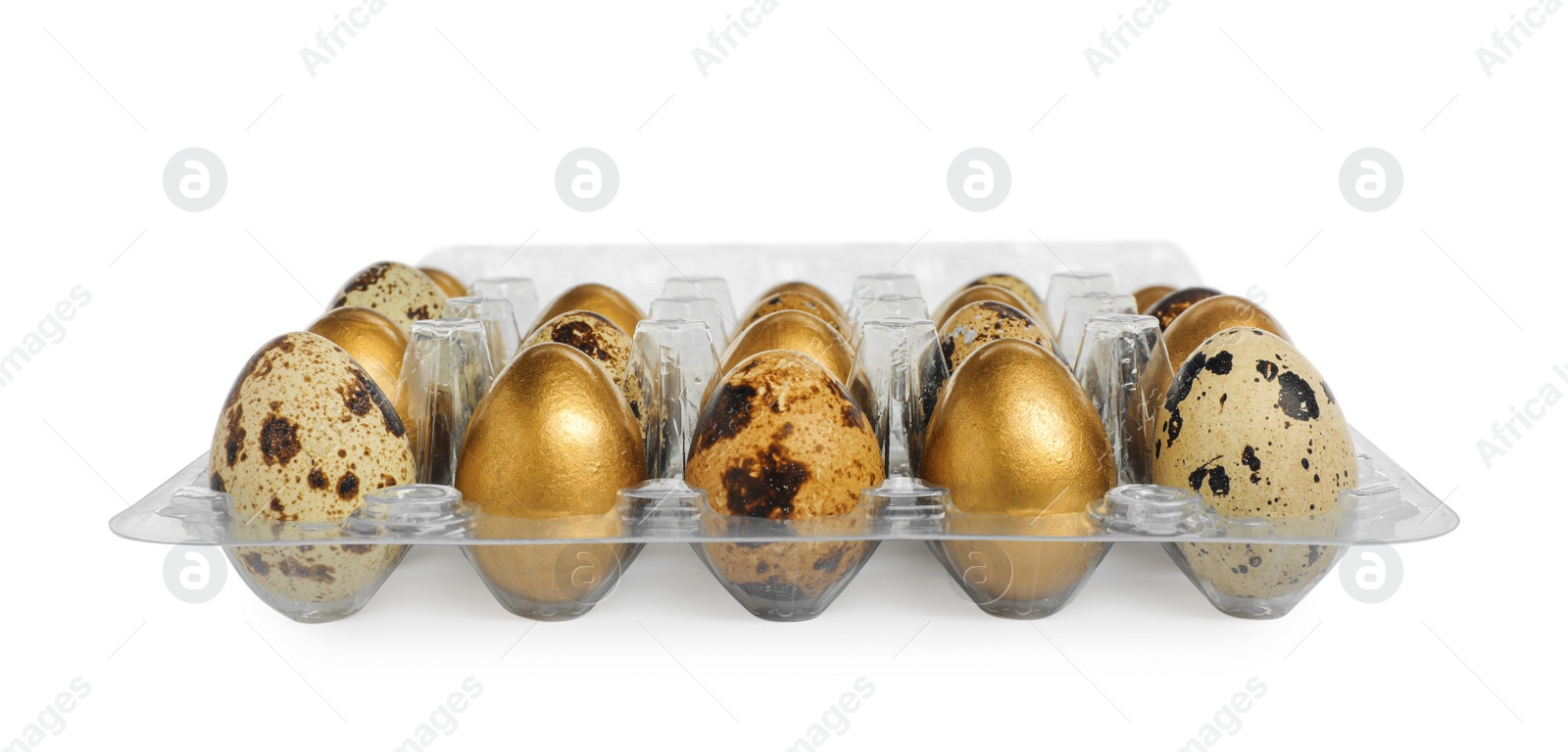Photo of Plastic container with golden eggs and quail ones on white background