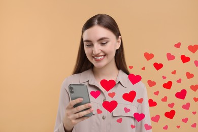 Image of Long distance love. Woman chatting with sweetheart via smartphone on dark beige background. Hearts flying out of device