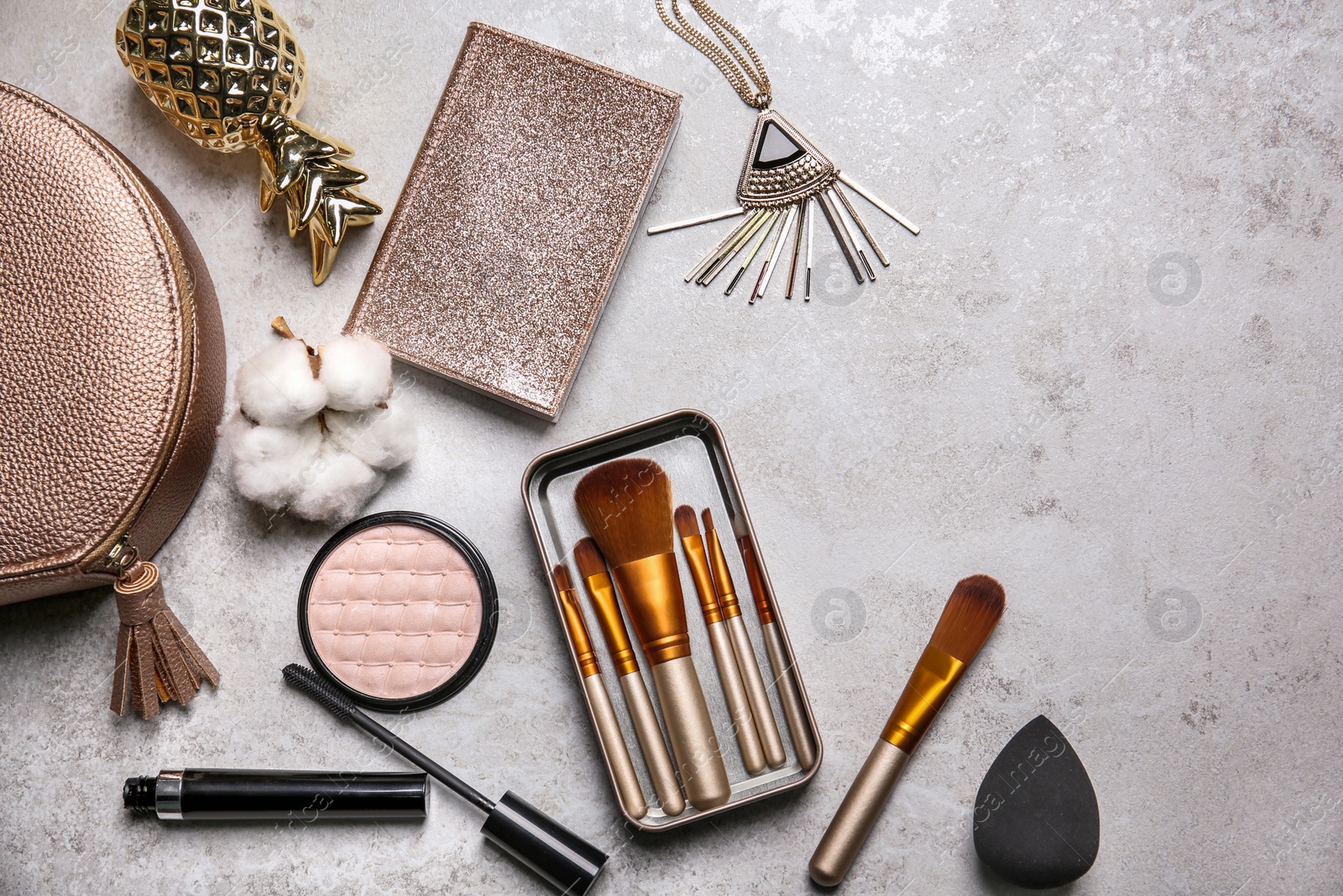 Photo of Flat lay composition with professional makeup brushes on light background