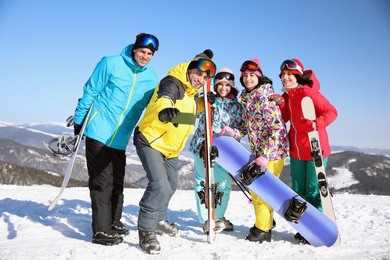 Photo of Group of friends taking selfie outdoors. Winter vacation