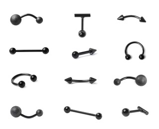 Image of Set with different piercing jewelry on white background