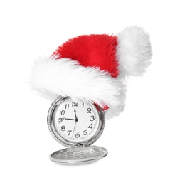 Photo of Pocket watch with Santa hat showing quarter to midnight on white background. New Year countdown
