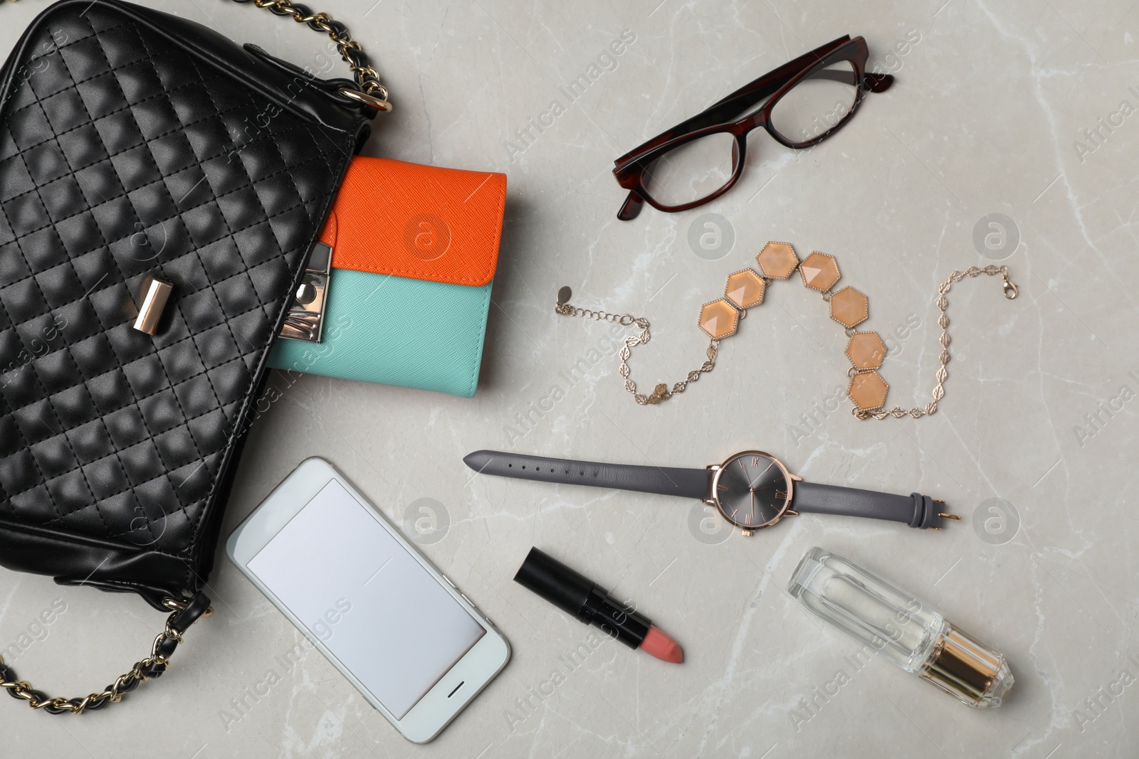 Photo of Flat lay composition with stylish bag, wallet and accessories on light background