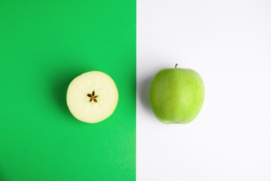 Photo of Flat lay composition of fresh ripe green apples on color background