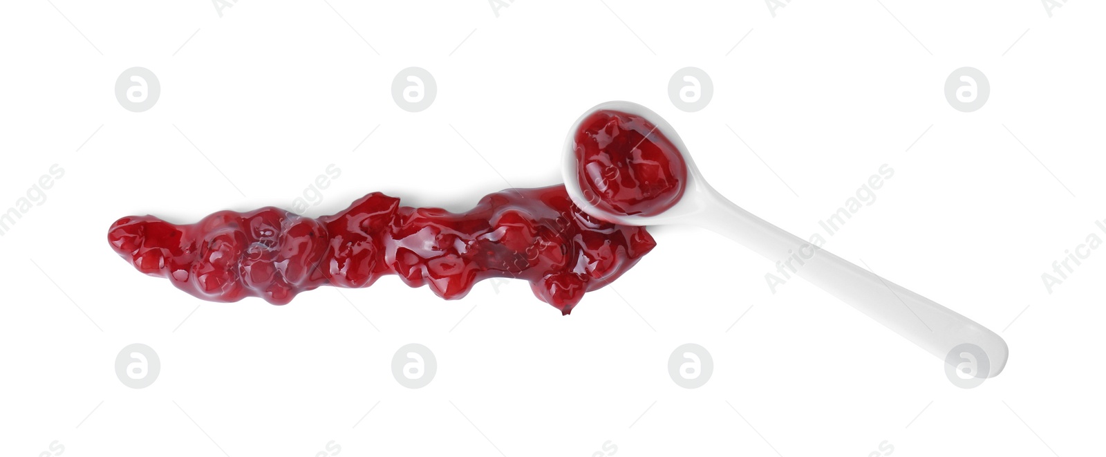 Photo of Spoon with fresh cranberry sauce isolated on white, top view