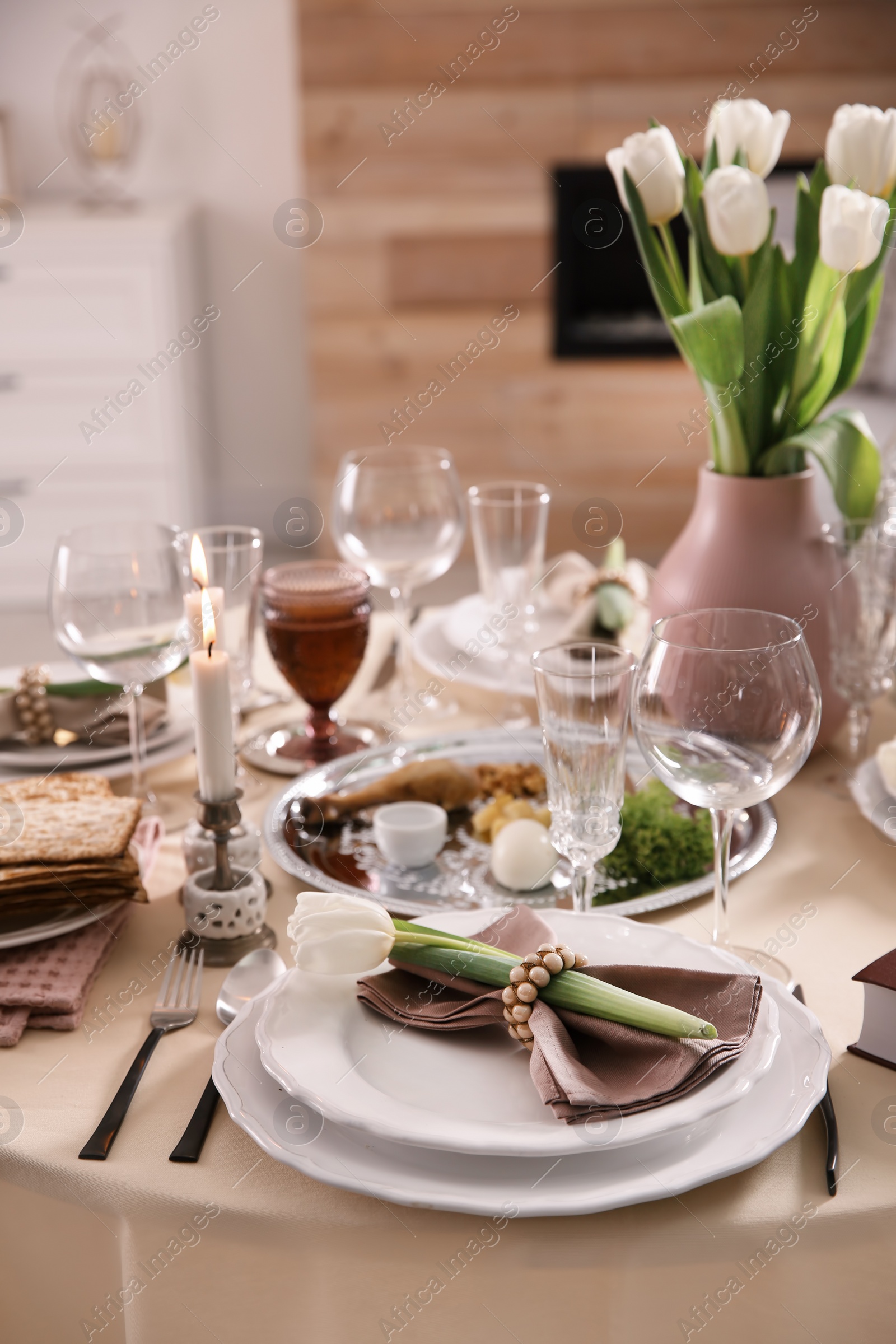 Photo of Festive Passover table setting at home. Pesach celebration