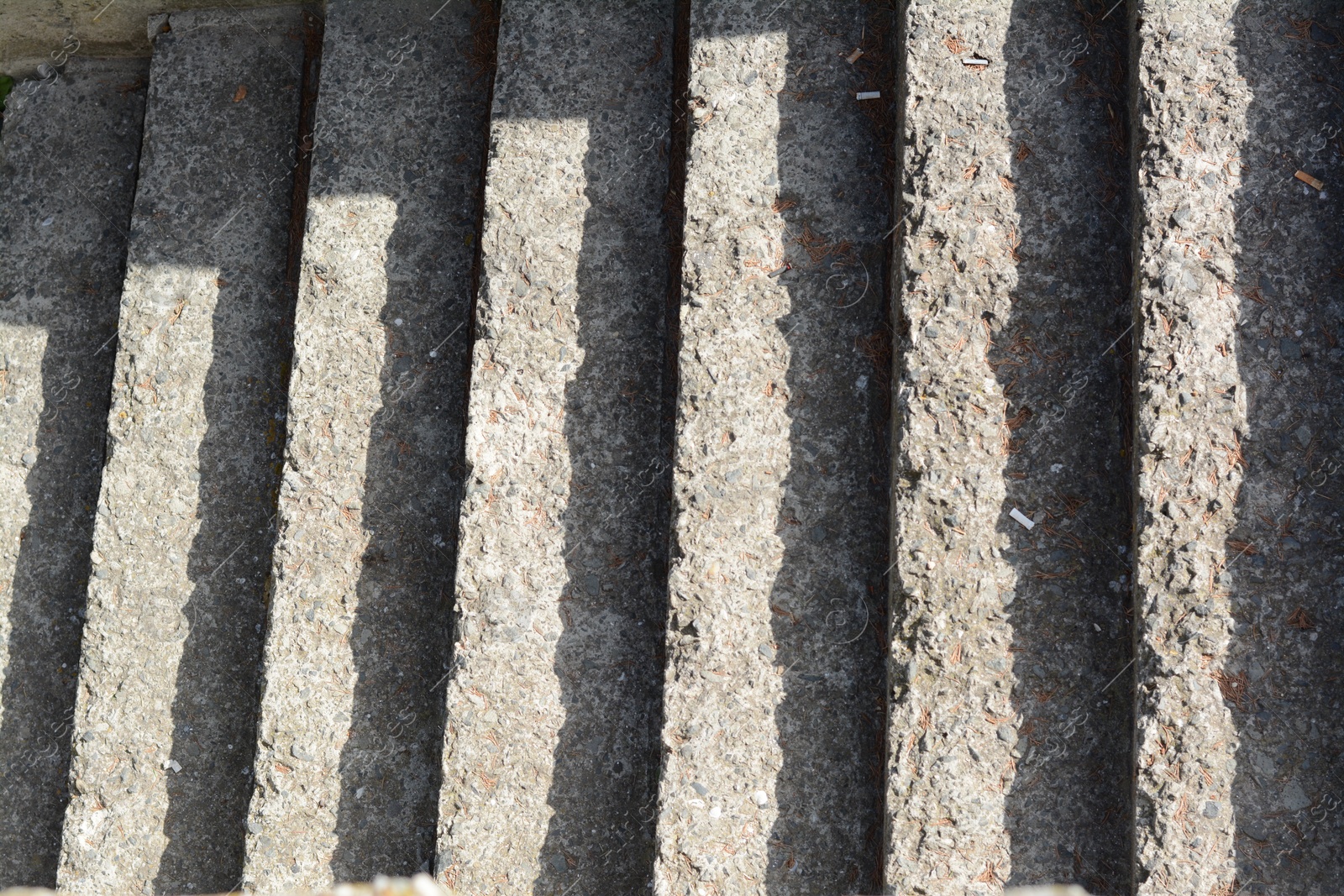 Photo of Old stone stairs on sunny day outdoors, top view