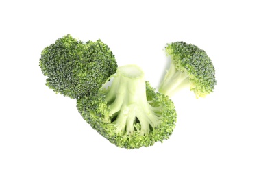 Photo of Fresh green broccoli on white background, top view. Organic food