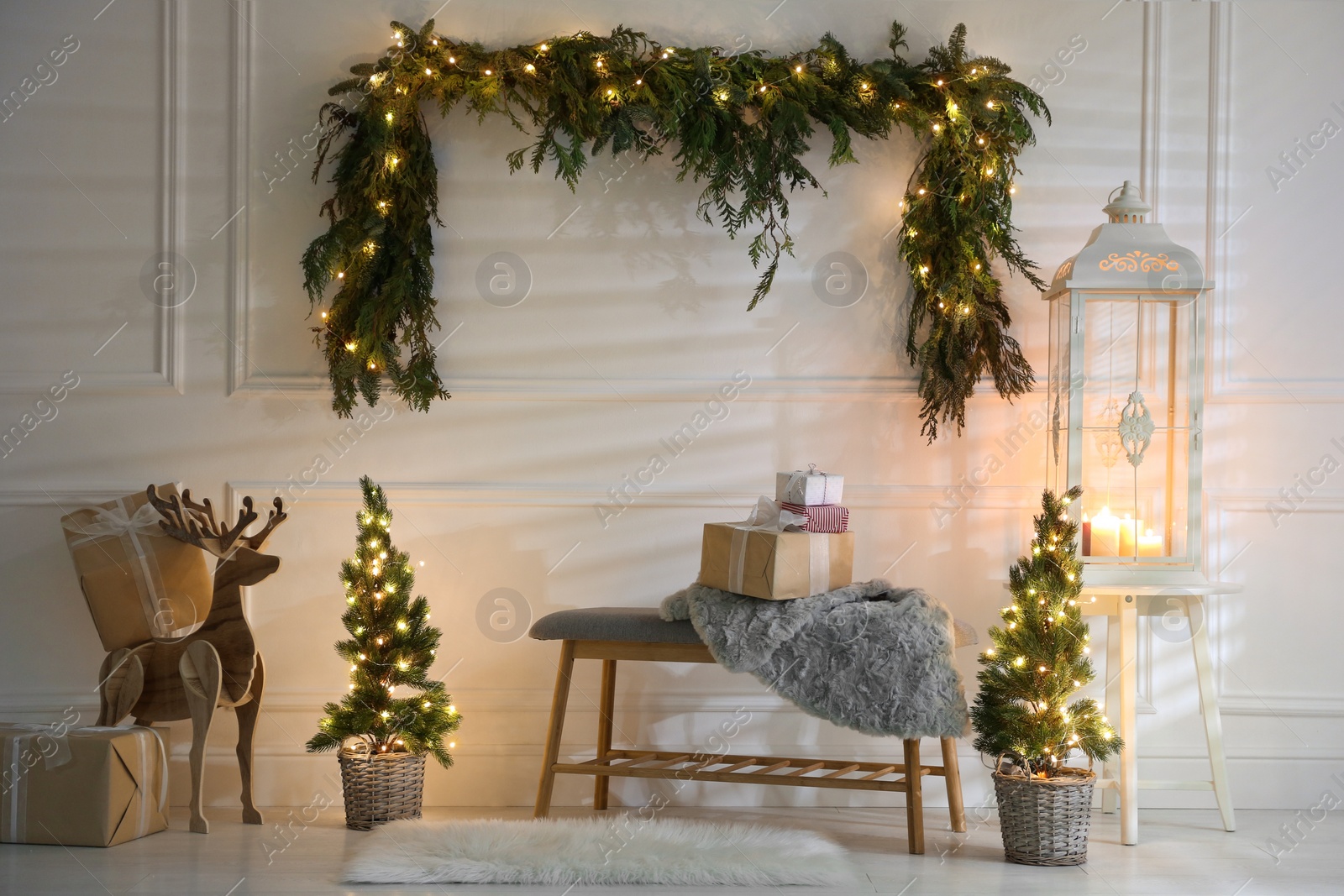 Photo of Beautiful Christmas themed photo zone with fir decor