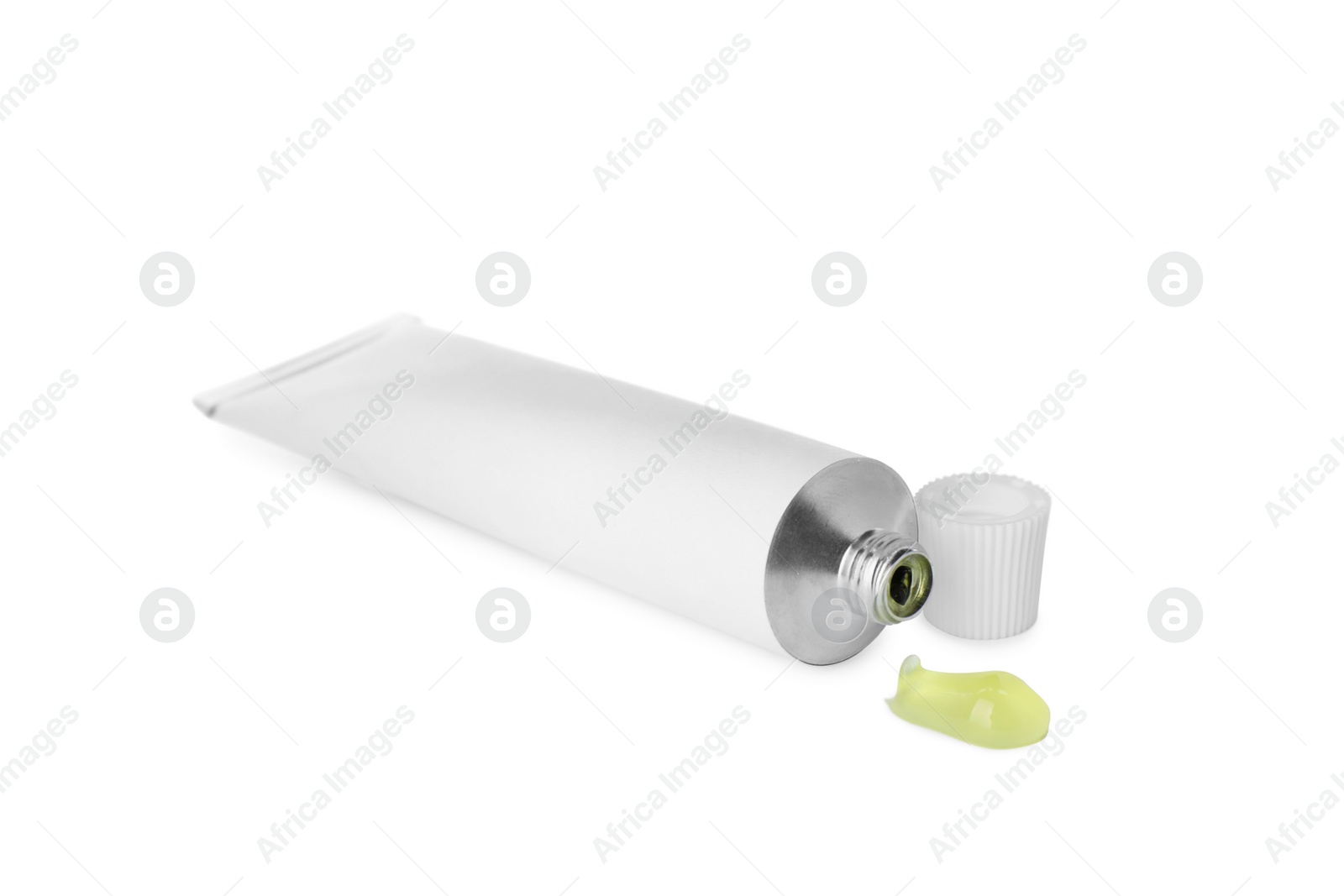 Photo of Open tube with ointment on white background