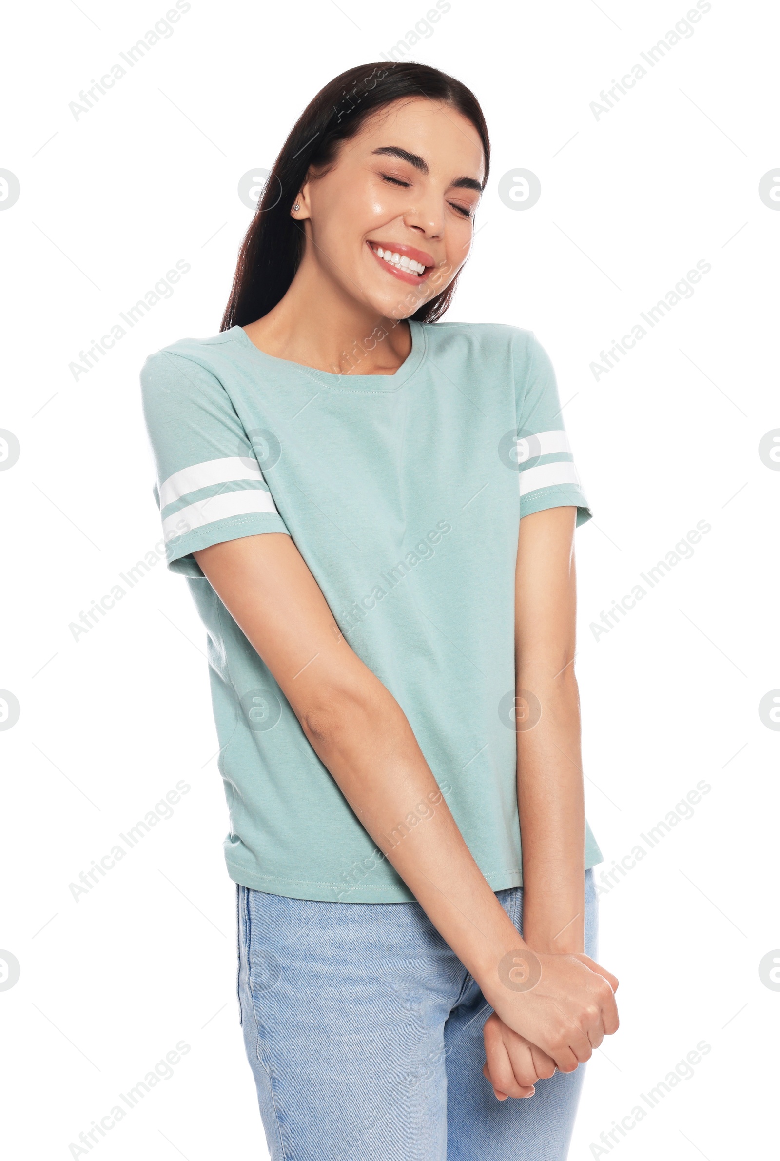 Photo of Embarrassed young woman in shirt on white background