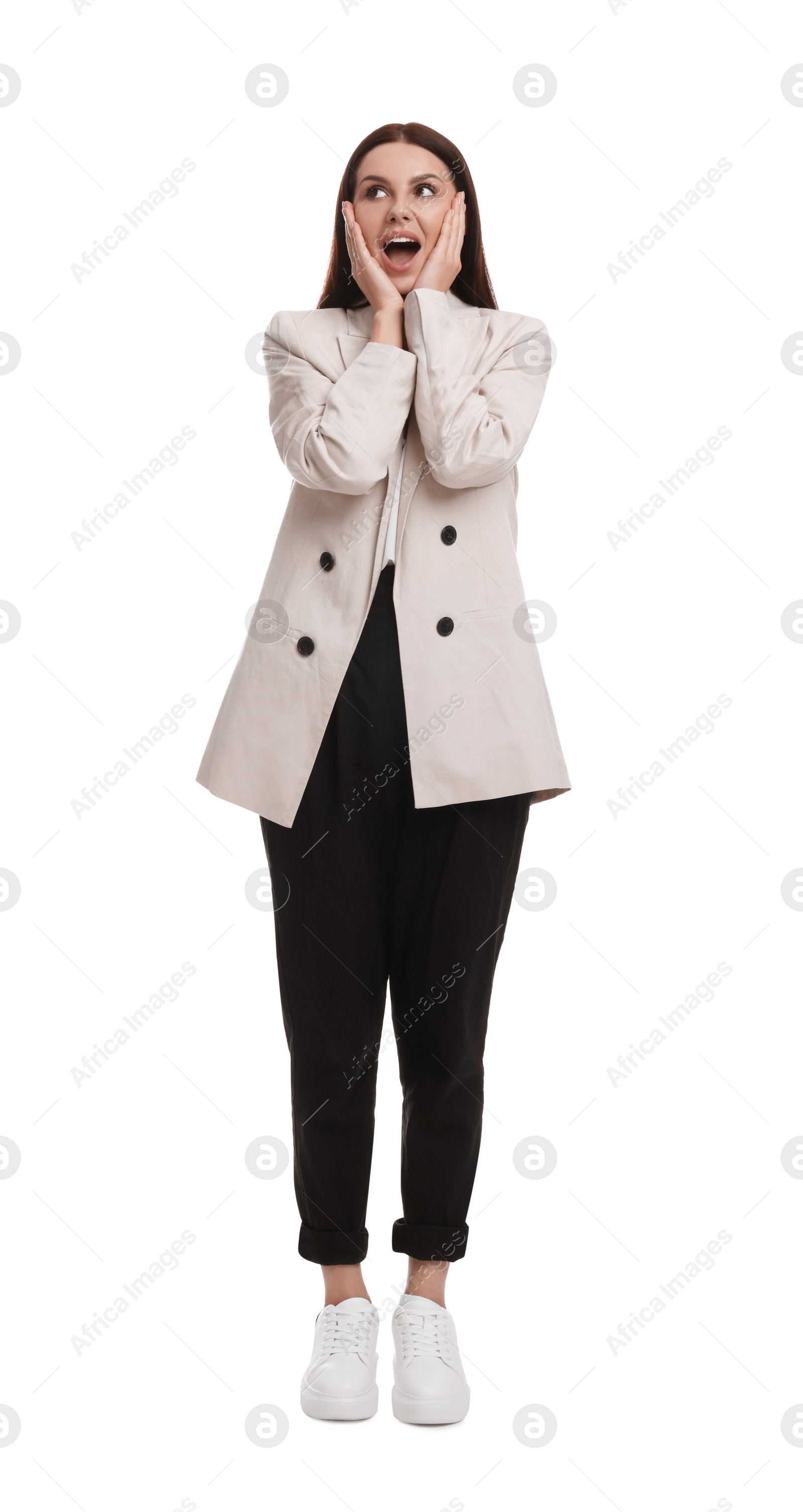 Photo of Beautiful emotional businesswoman in suit on white background
