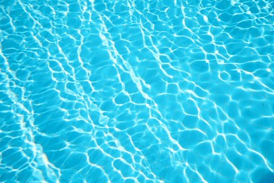 Clear water in outdoor swimming pool on sunny day