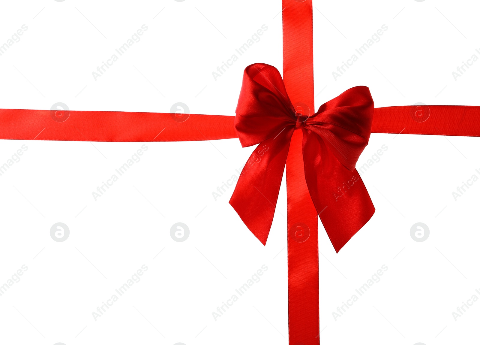 Photo of Red ribbon with bow on white background. Festive decoration