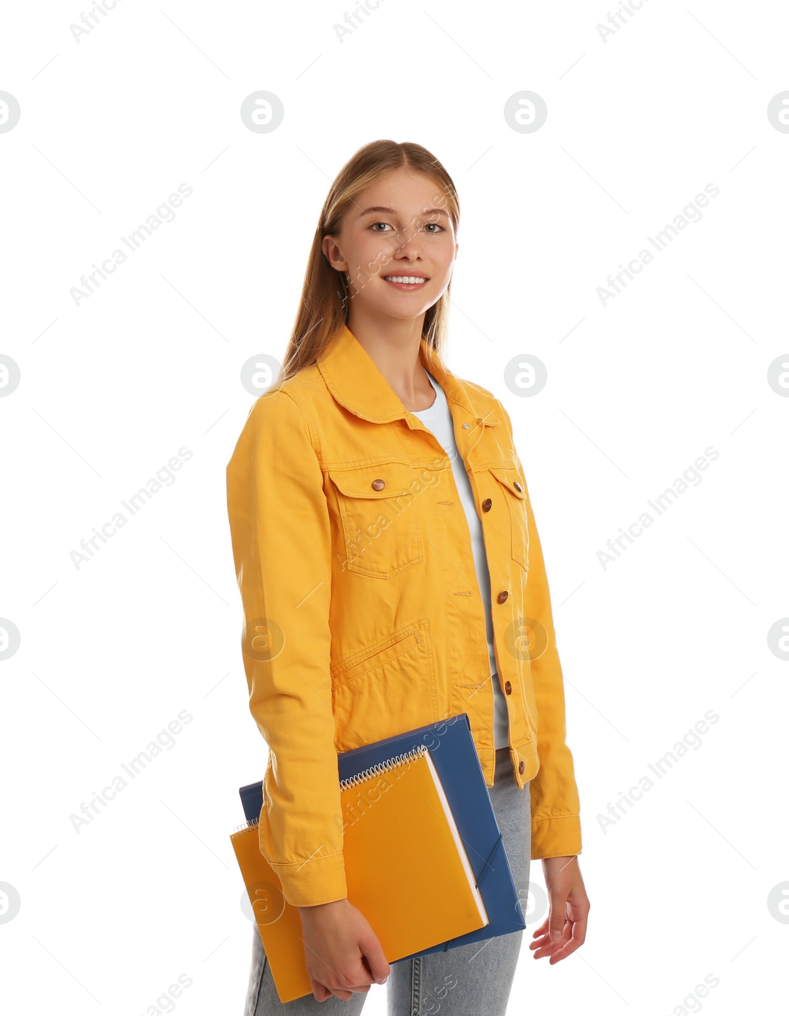 Photo of Teenage student holding stationery on white background