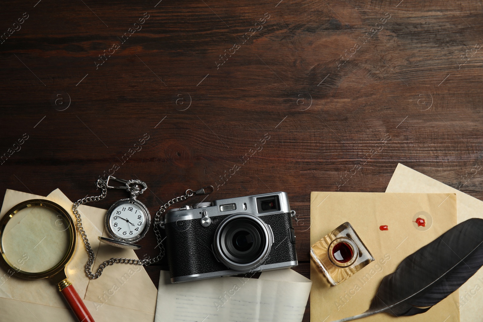 Photo of Composition with different vintage items on wooden background, space for text. Detective layout