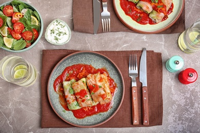 Tasty cabbage rolls served for dinner on table