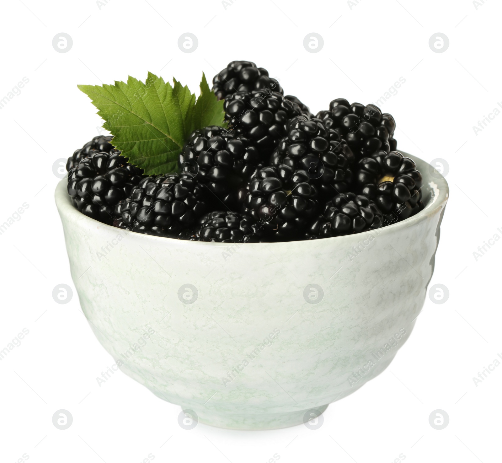 Photo of Bowl with fresh ripe blackberries isolated on white