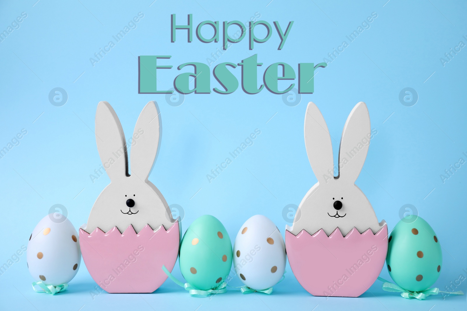 Image of Easter bunnies and painted eggs on light blue background