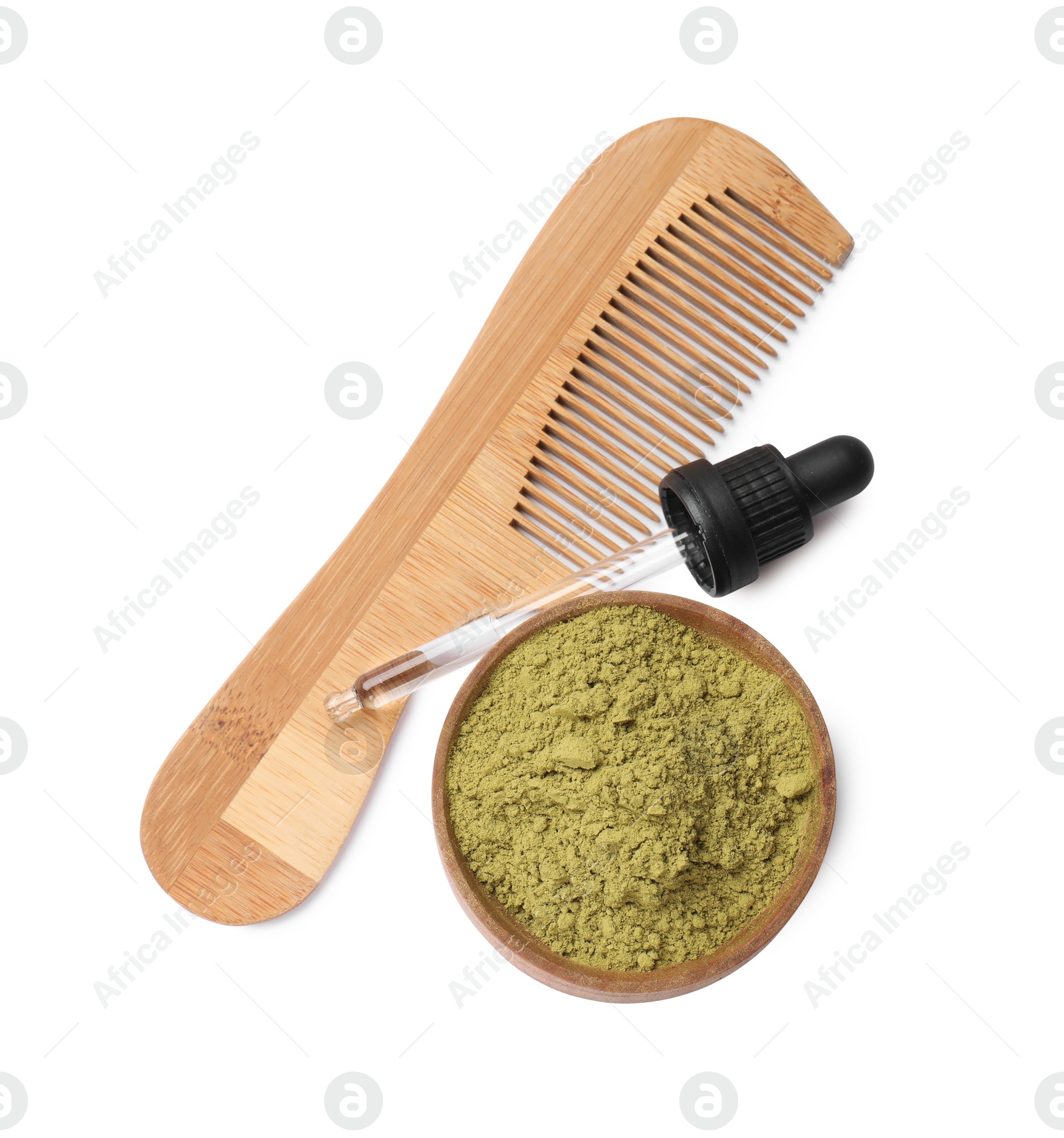 Photo of Henna powder in bowl, dropper and comb isolated on white, top view