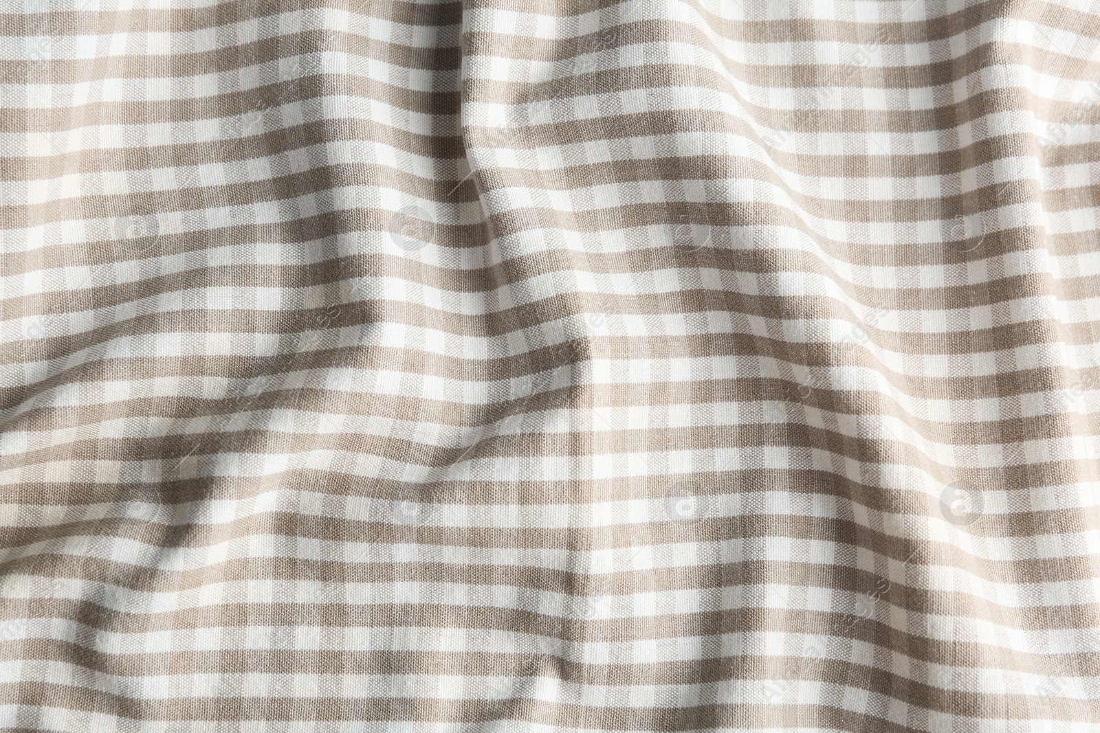 Photo of Texture of white checkered fabric as background, closeup