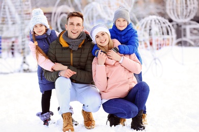 Photo of Portraithappy family outdoors on winter day