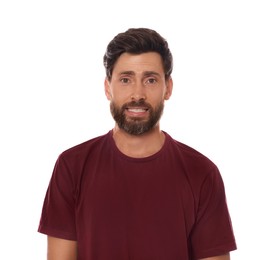 Embarrassed man in shirt on white background