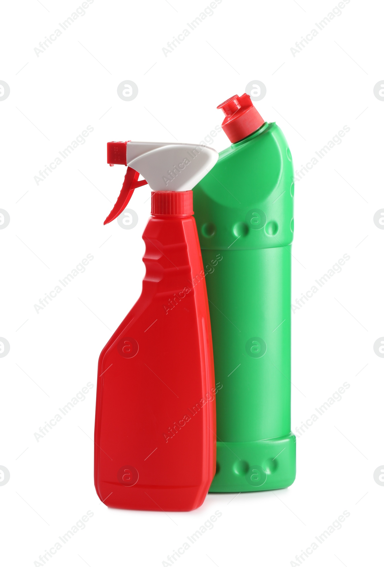 Photo of Bottles of different cleaning products isolated on white