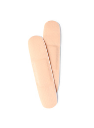 Photo of Medical sticking plasters isolated on white. First aid item