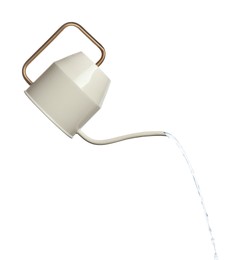 Image of Pouring liquid from watering can on white background