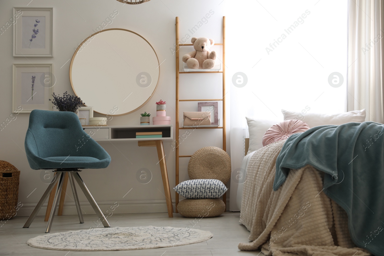 Photo of Teenage girl's bedroom interior with stylish furniture. Idea for design