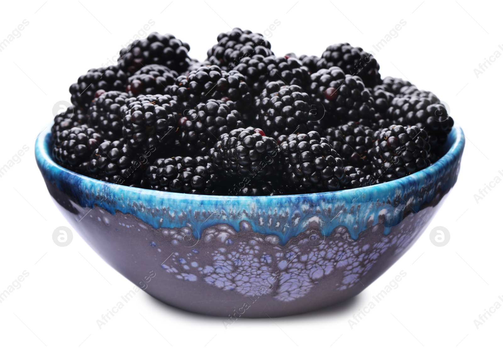 Photo of Blue bowl of tasty ripe blackberries on white background