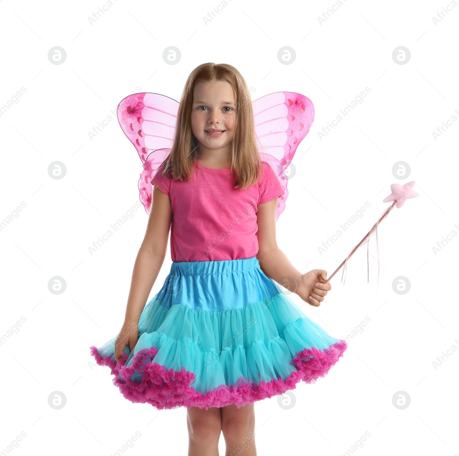 Photo of Cute little girl in fairy costume with pink wings and magic wand on white background