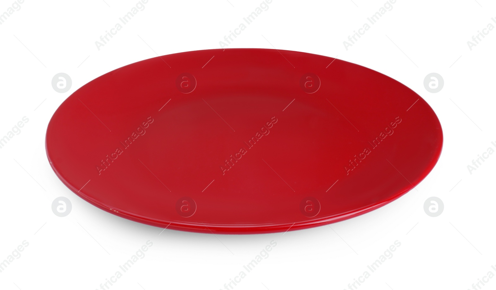 Photo of Empty red ceramic plate isolated on white