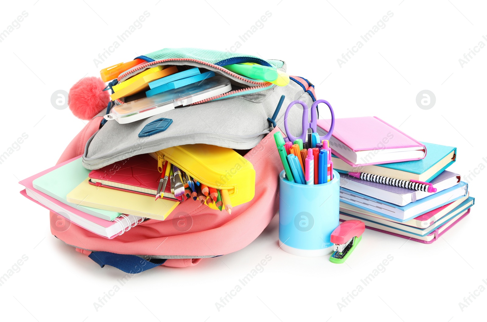 Photo of Backpack and school stationery on white background