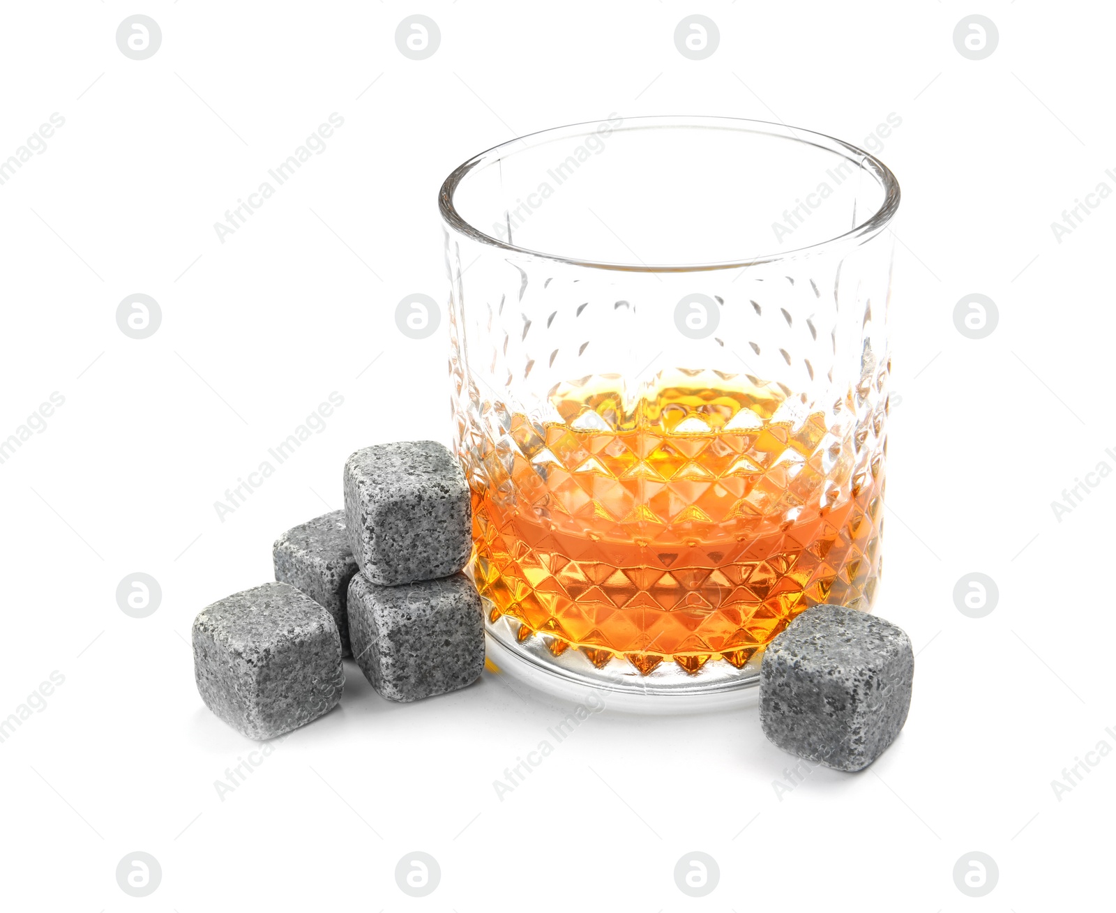 Photo of Glass with liquor and whiskey stones on white background