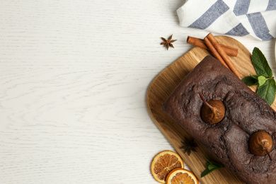 Photo of Flat lay composition with tasty pear bread on white wooden table, space for text. Homemade cake