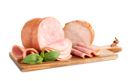 Photo of Tasty ham with basil on wooden board, white background