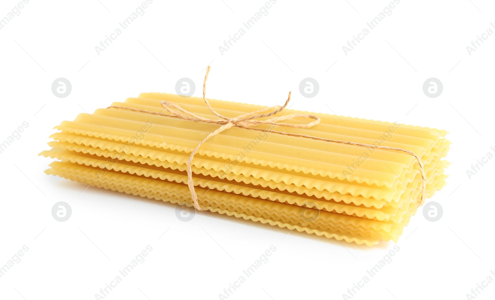 Photo of Stack of uncooked lasagna sheets isolated on white