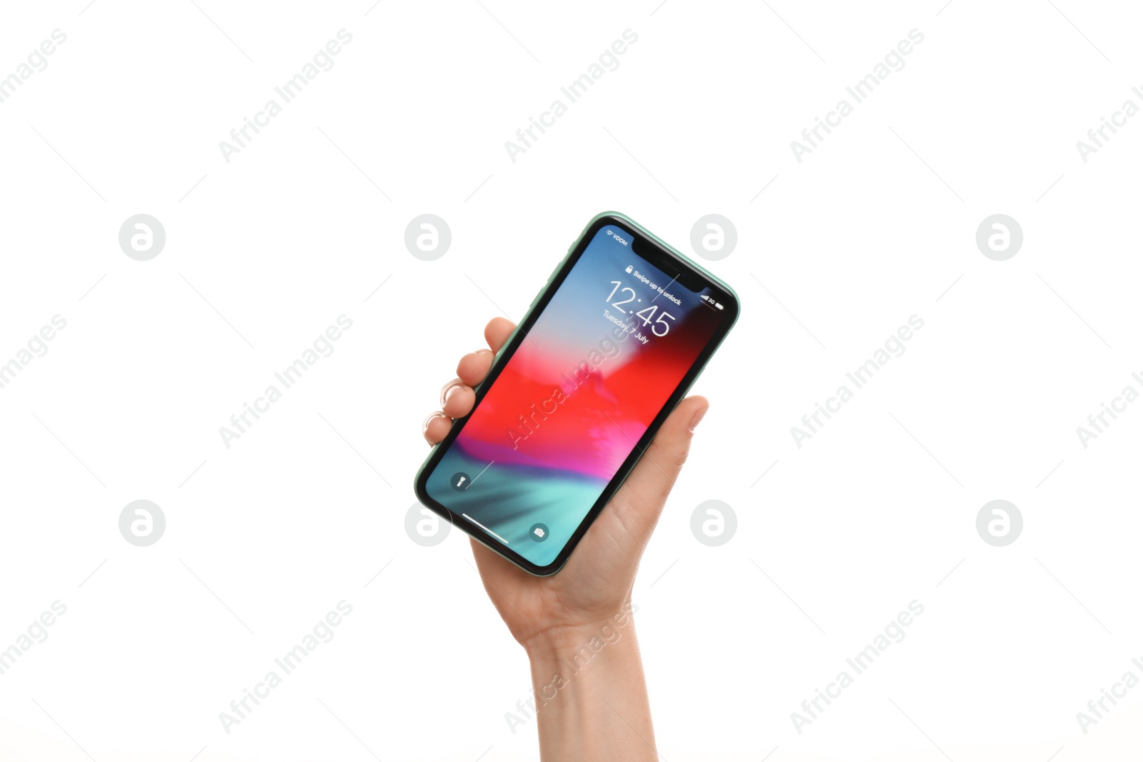 Photo of MYKOLAIV, UKRAINE - JUNE 9, 2020: Woman holding  iPhone X with locked screen on white background, closeup