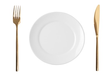 Image of Empty plate with golden fork and knife on white background, top view