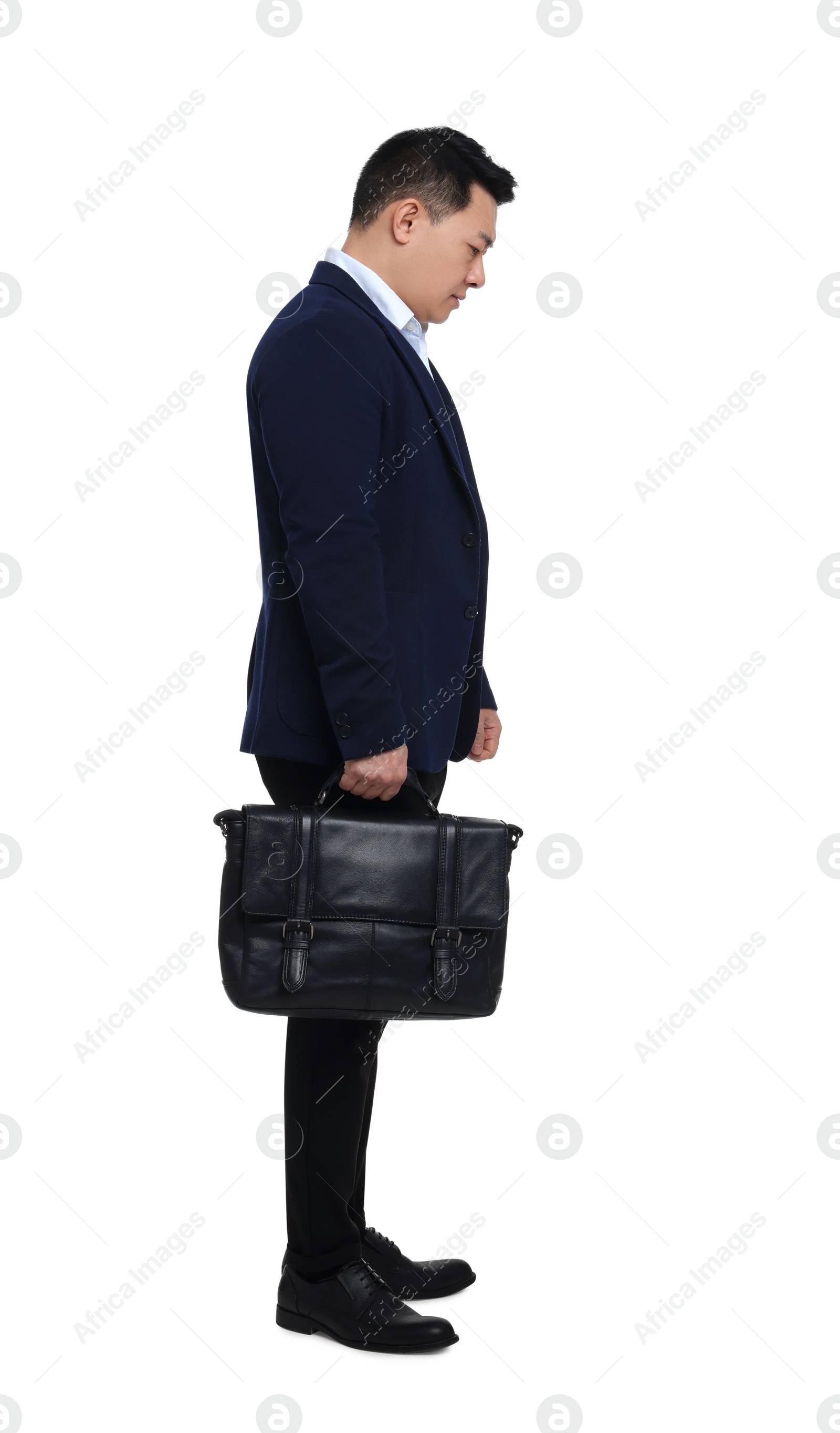 Photo of Tired businessman with briefcase posing on white background